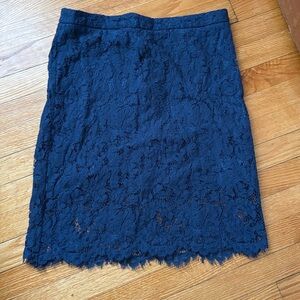 Blue lace skirt/ hits at about the knee level